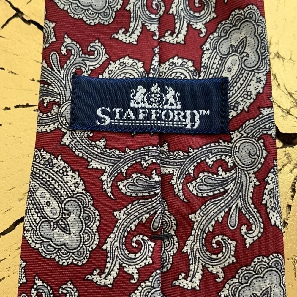 Stafford Men’s Tie. Large Paisley Design. Base is Burgundy w/Gray Accents.